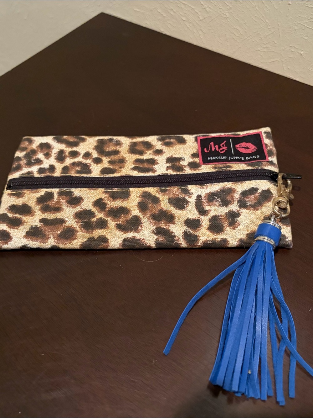 Makeup Junkie Leopard Print Wristlet Pouch with Blue Tassel